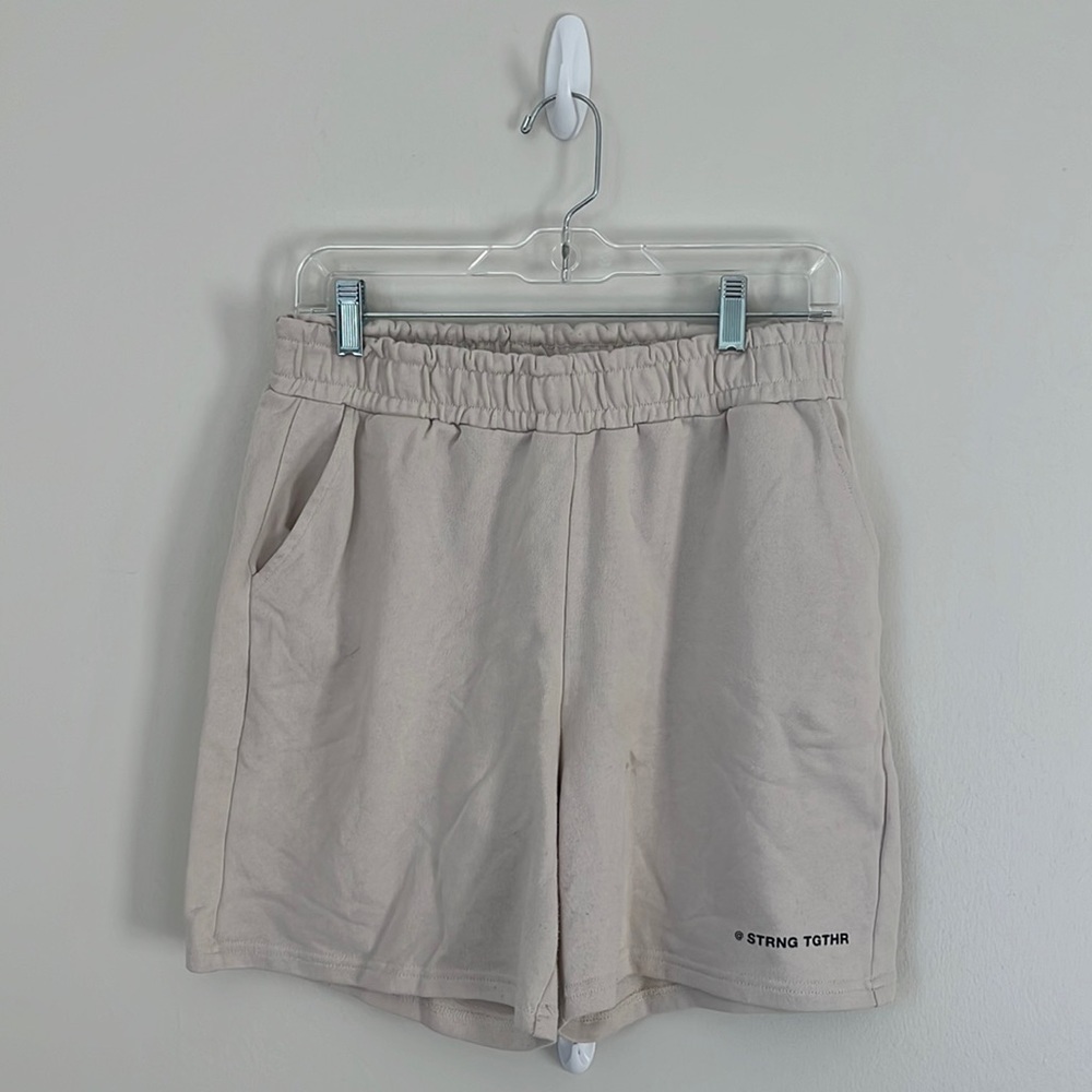 Stronger Together Cream Sweat Shorts!